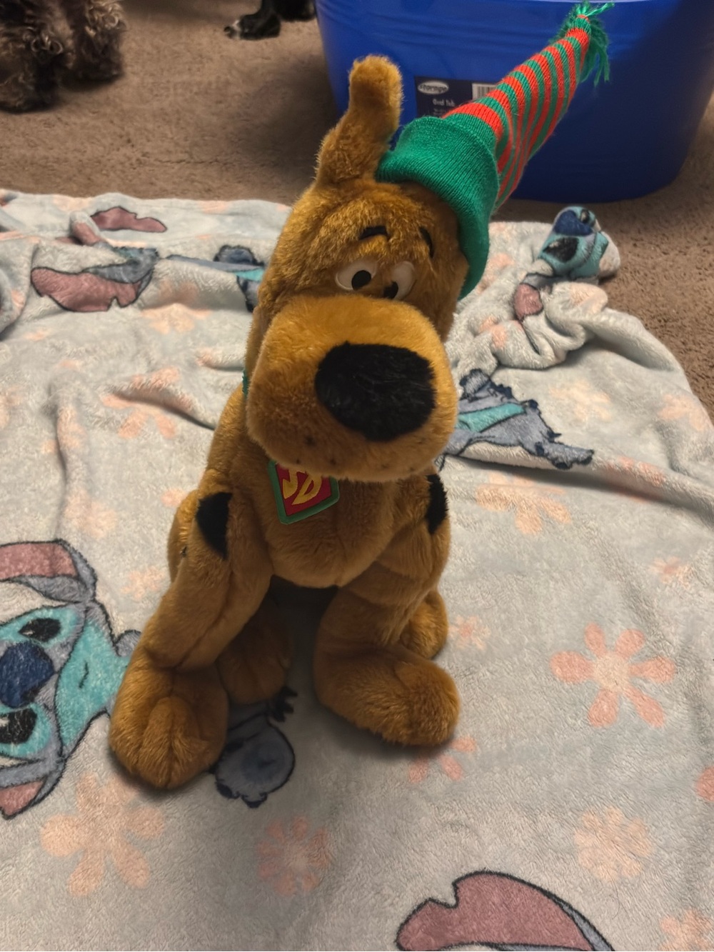 Plush Brown Holiday Puppy with Green and Red Striped Hat